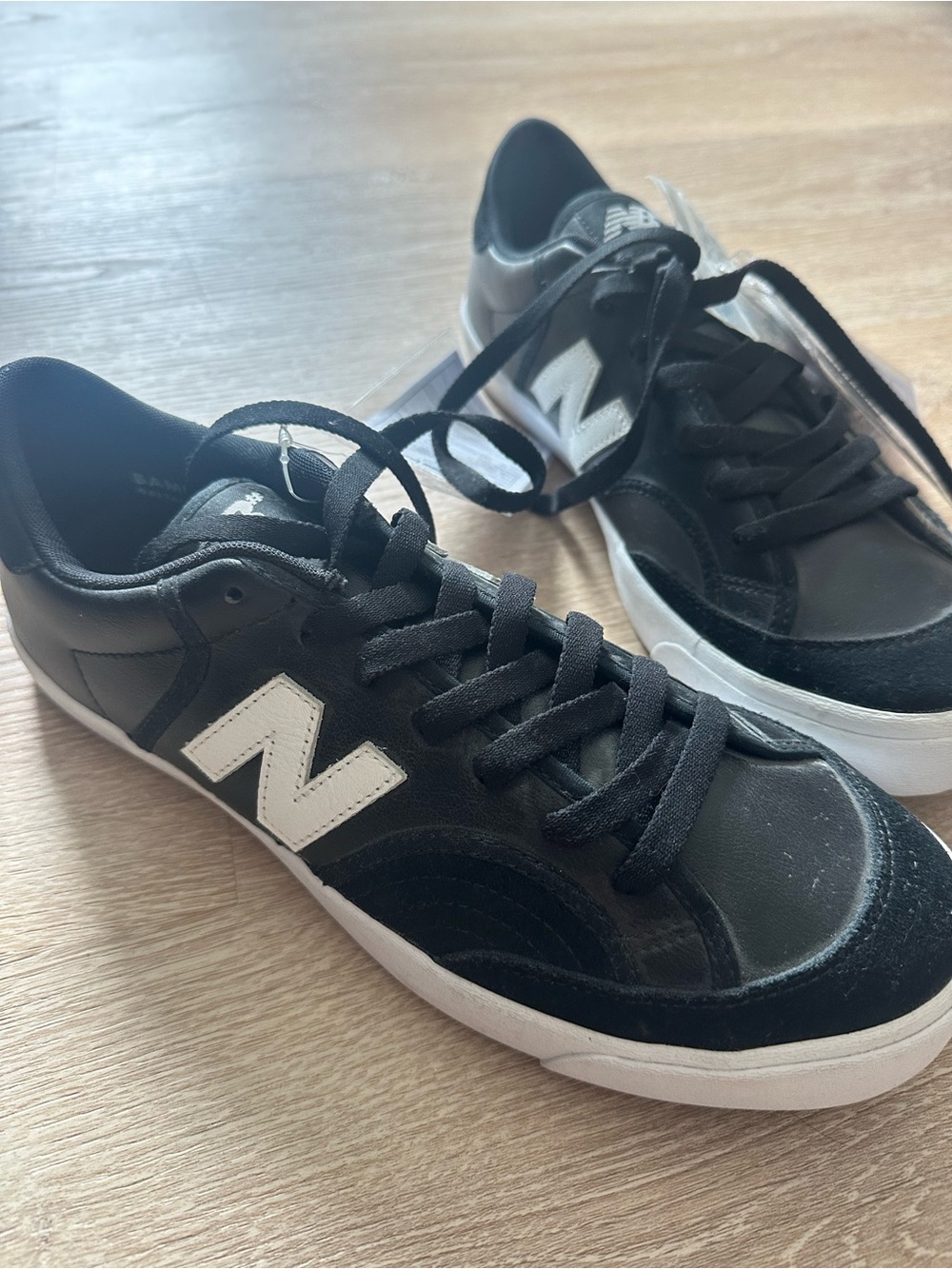 New Balance Black and White Low-Top Sneakers